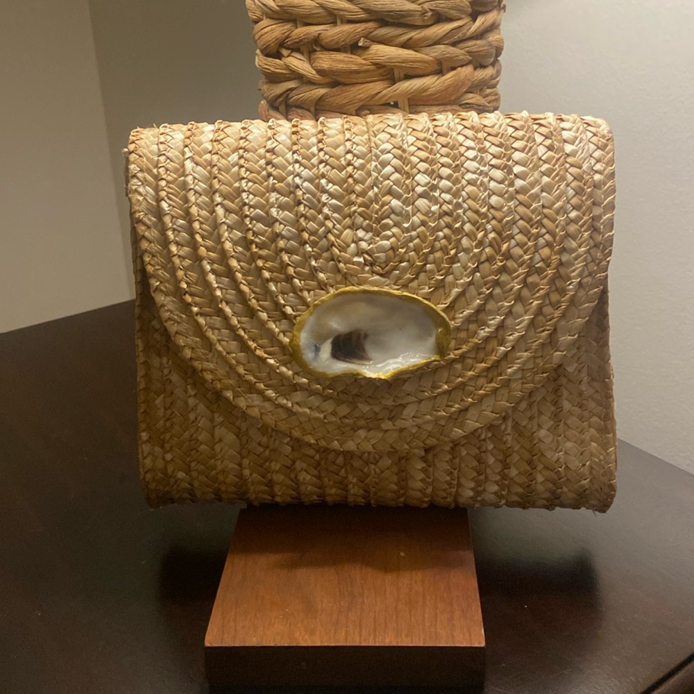 Oyster shell embellished straw clutch
